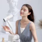 Portable folding ionic hair dryer
